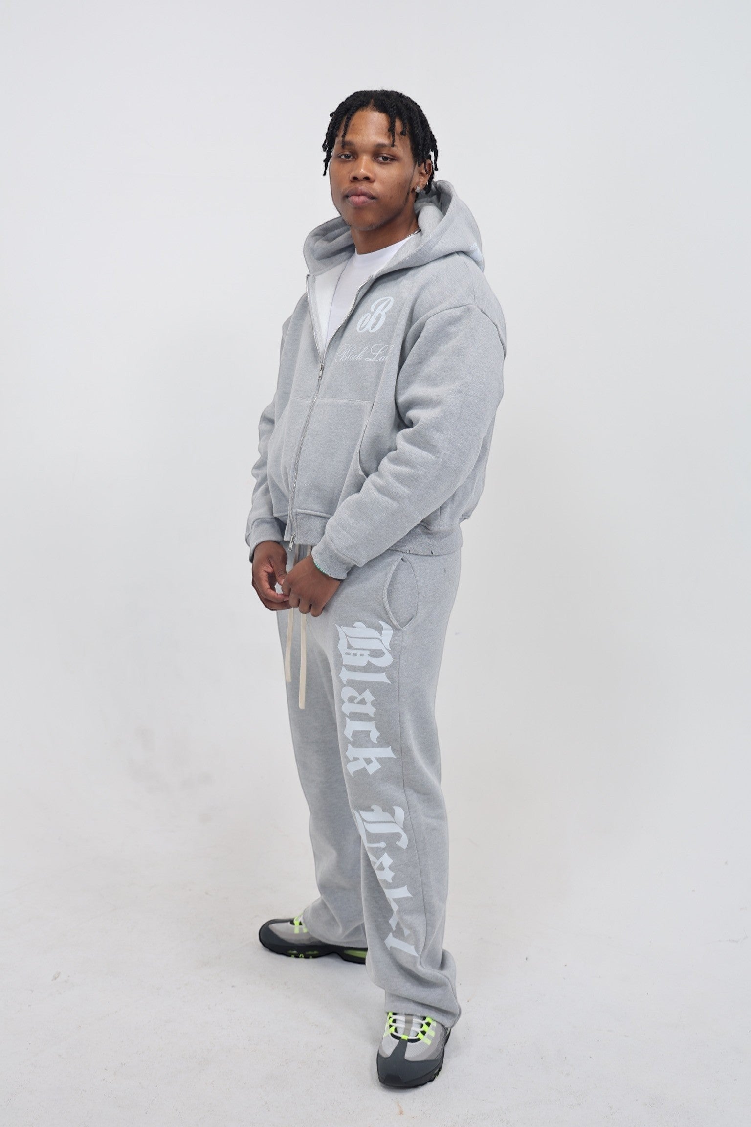 Black Label Clothing Brand grey heavyweight cotton sweatsuit with acid wash finish and bold graphics. Oversized fit.